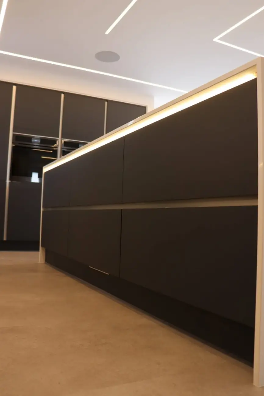 Kitchen island cabinetry with LED under-lighting